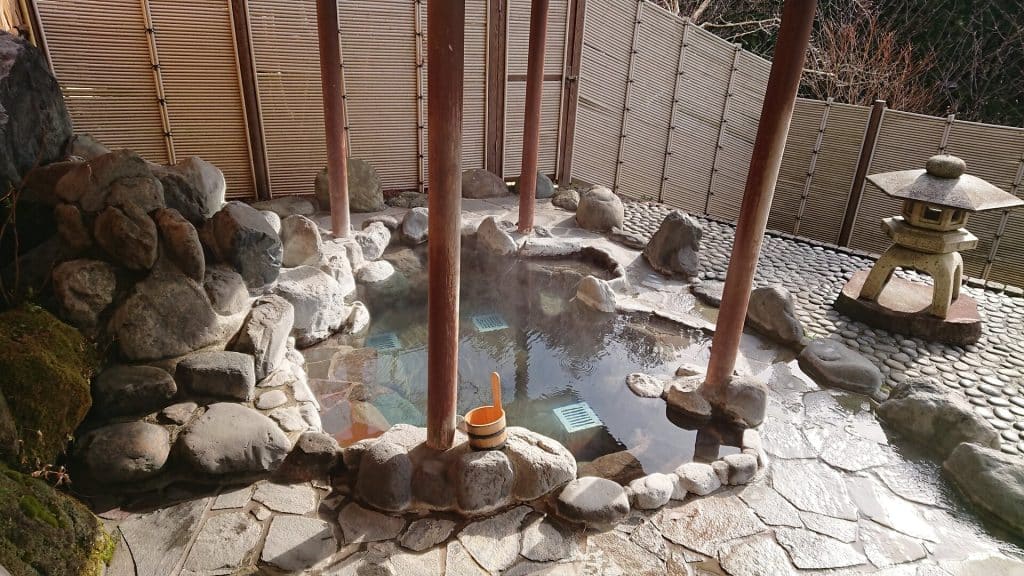 It is a picture of Hot spring in Hakone, Japan. It's called Onsen