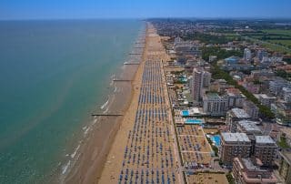 Aerial view Jesolo beach near Venice, Italy. Resort town in the north of Italy. Resorts of the Adriatic Sea.