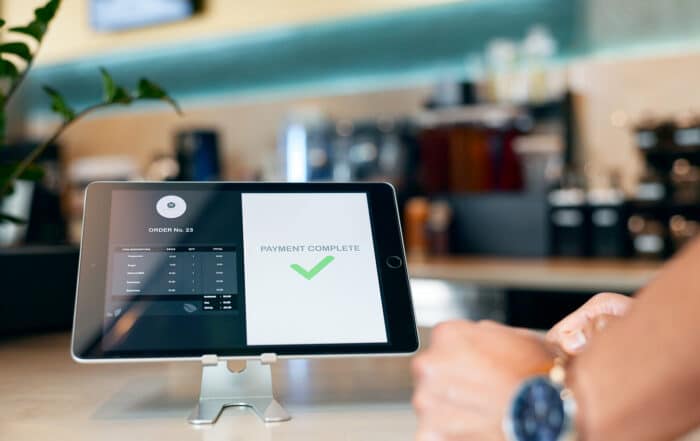 Business, restaurant and tablet for payment by online, internet or network for e commerce, fintech or digital. Technology, screen and customer for success in transaction with app for connectivity.