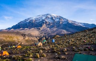 Camping on mount Kilimanjaro in tents to see the glaciers in Tanzania, Africa