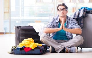 Young man preparing for vacation travel