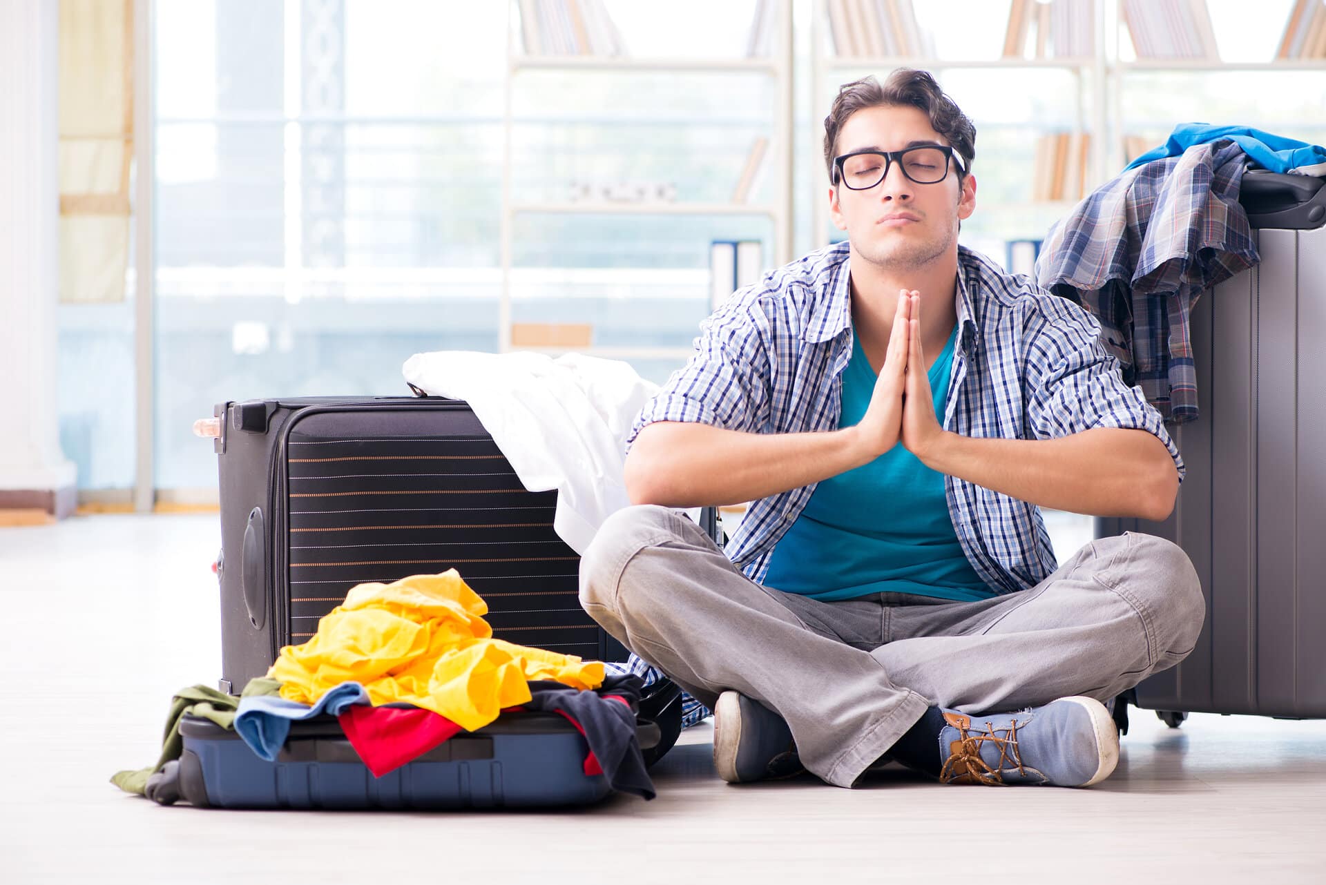 Young man preparing for vacation travel